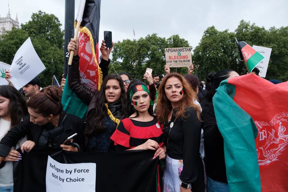 Proteste von afghanische Frauen, die geflüchtet sind